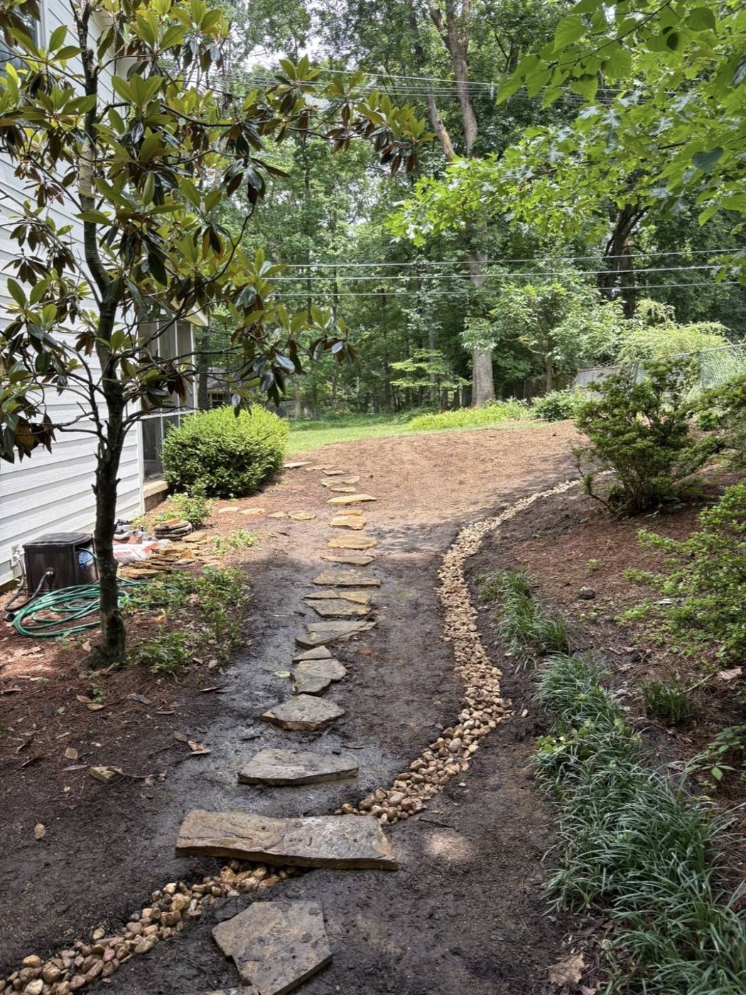 Stone stepping-path landscape installation by Bulldog Land Management