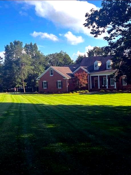 Freshly striped lawn maintained by Bulldog Land Management